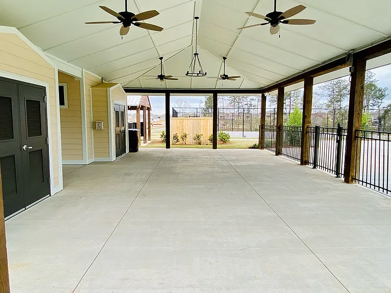 Community covered gathering area next to pool