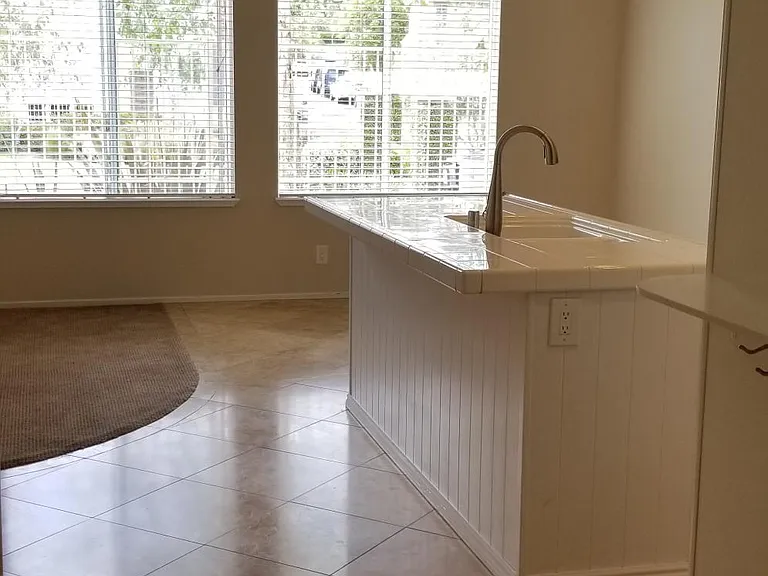 View of kitchen and dining room from hallway