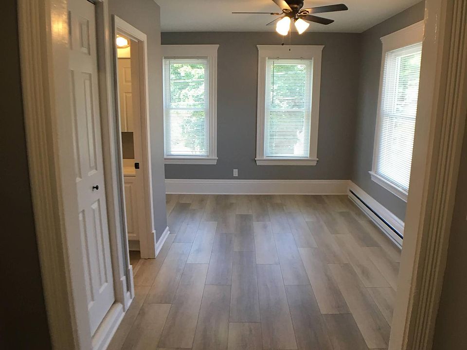 Hallway showing view into living room