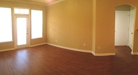 Natural light, and archway entry to the bedroom