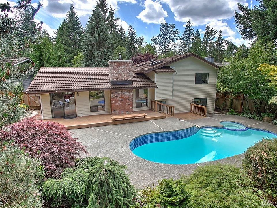 Welcome home to Fairwood Greens! This 4 bedroom, 3 bathroom tri-level home is located on a quiet cul-de-sac in a park like setting. The spacious eat-in kitchen features custom cherry cabinets, stainless steel appliances and large buffet counter, open to the living and dining room. Through a slider, extend your living space outside to a gorgeous, private back yard with spectacular pool and fire pit. On the upper floor, you will find a large master suite with a wall of closets and 3/4 ensuite bath along with 3 additional bedrooms and full bath. On the lower level, you will find a huge rec room space - perfect for hanging out and watching movies. 