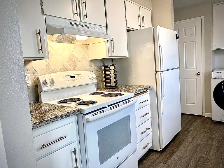 Large pantry and entry door (not shown) to garage for direct garage access.