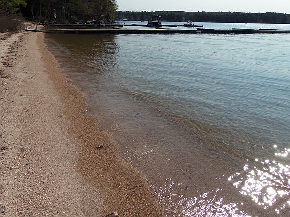 437 FEET OF COMMON BEACH