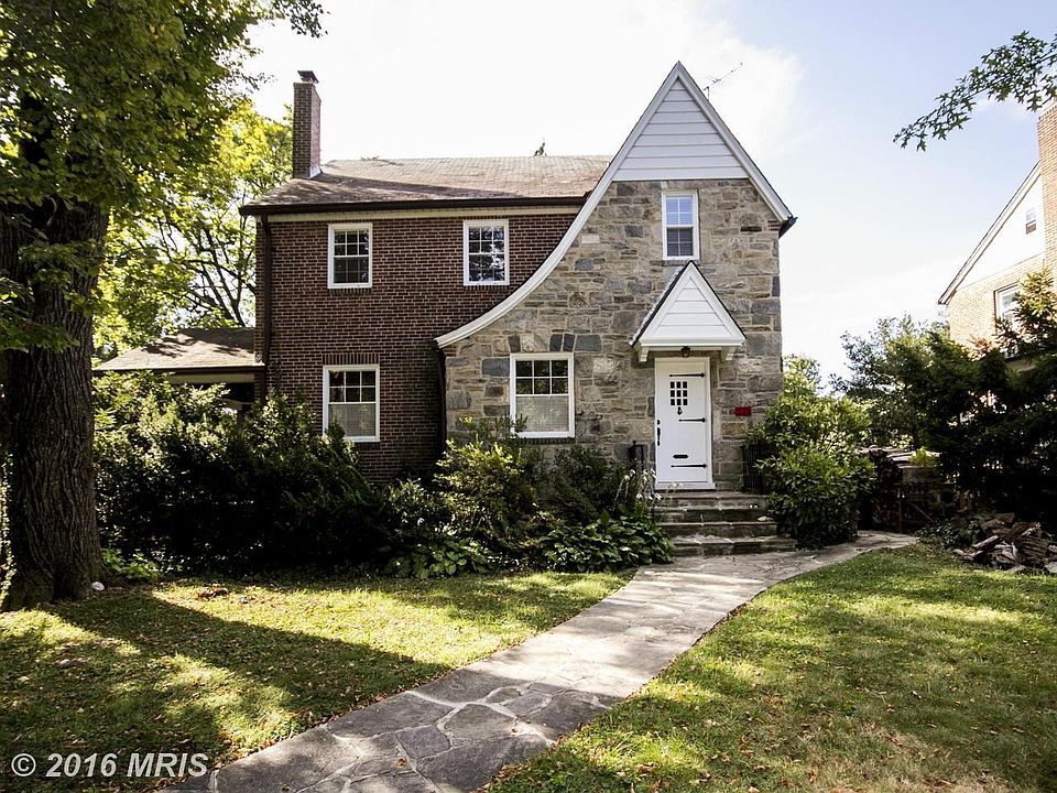 Beautiful Tudor Revival of stone and brick.
