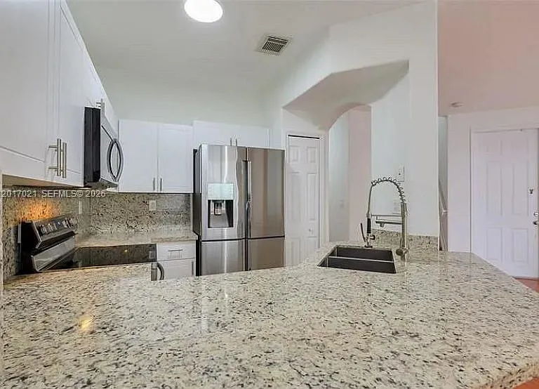 7772 NW 114th Pl — Photo 19