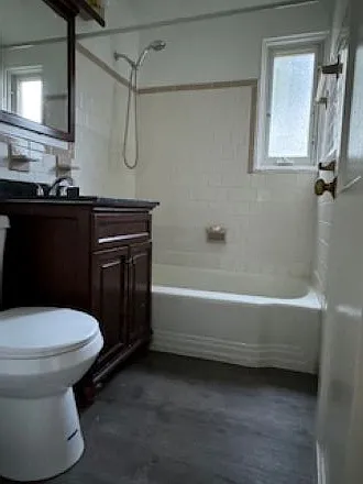Hall Bath - new floor and toilet