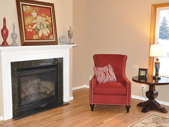 Gas fireplace with granite surround
						:
						This lovely gas fireplace is perfect for hanging your Christmas stockings.