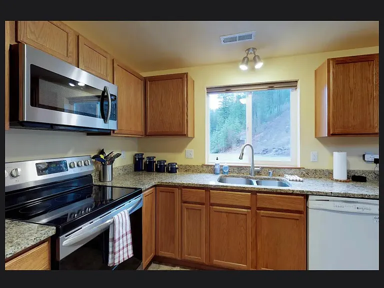kitchen with newer appliances, and lots of storage