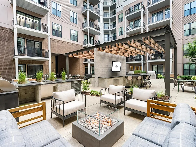Grill, gather, and unwind in our central courtyard with ample seating and cozy firepit.