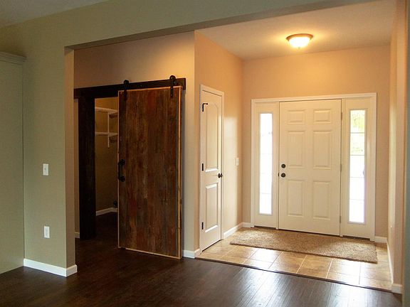 Front Foyer & Barn Door to Laundry