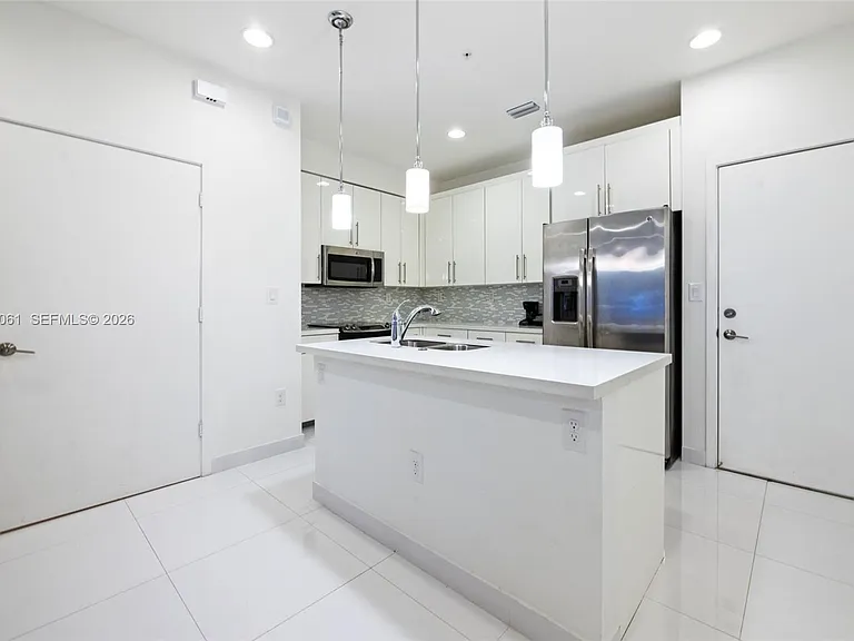2641 NE 212th Ter #209 — Photo 2