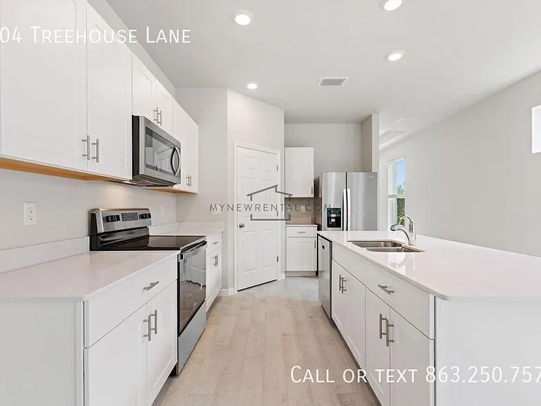 704 Treehouse Ln — Photo 11