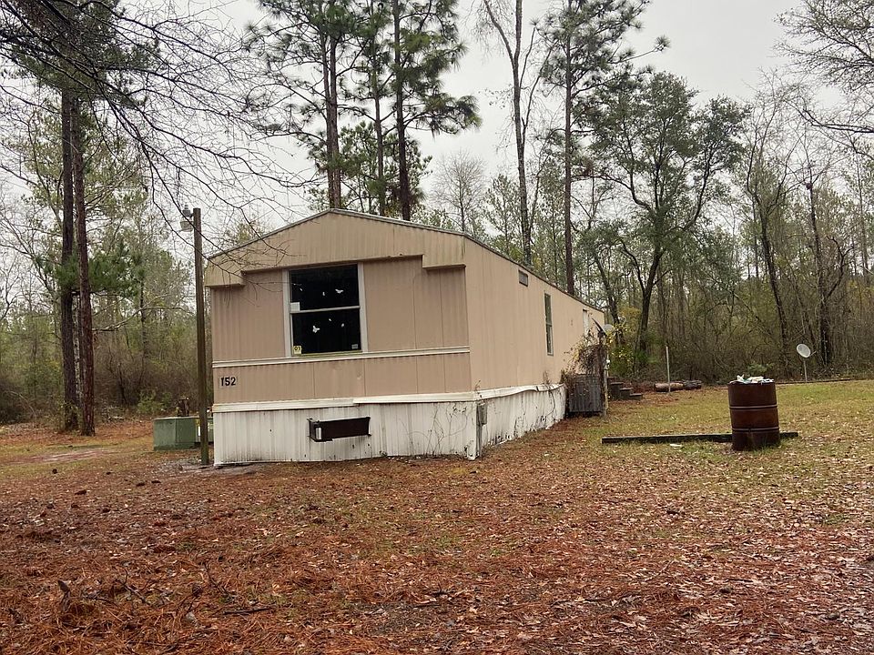 Front of home with plenty of yard space.