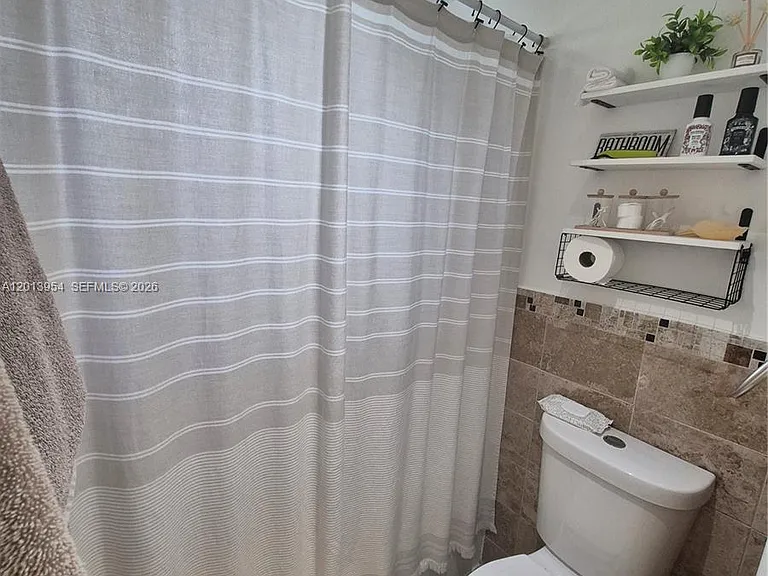 1975 NE 135th St #2H — Photo 14