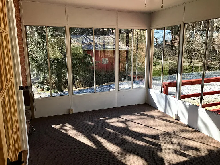 Sun room. Kitchen entrance on left.