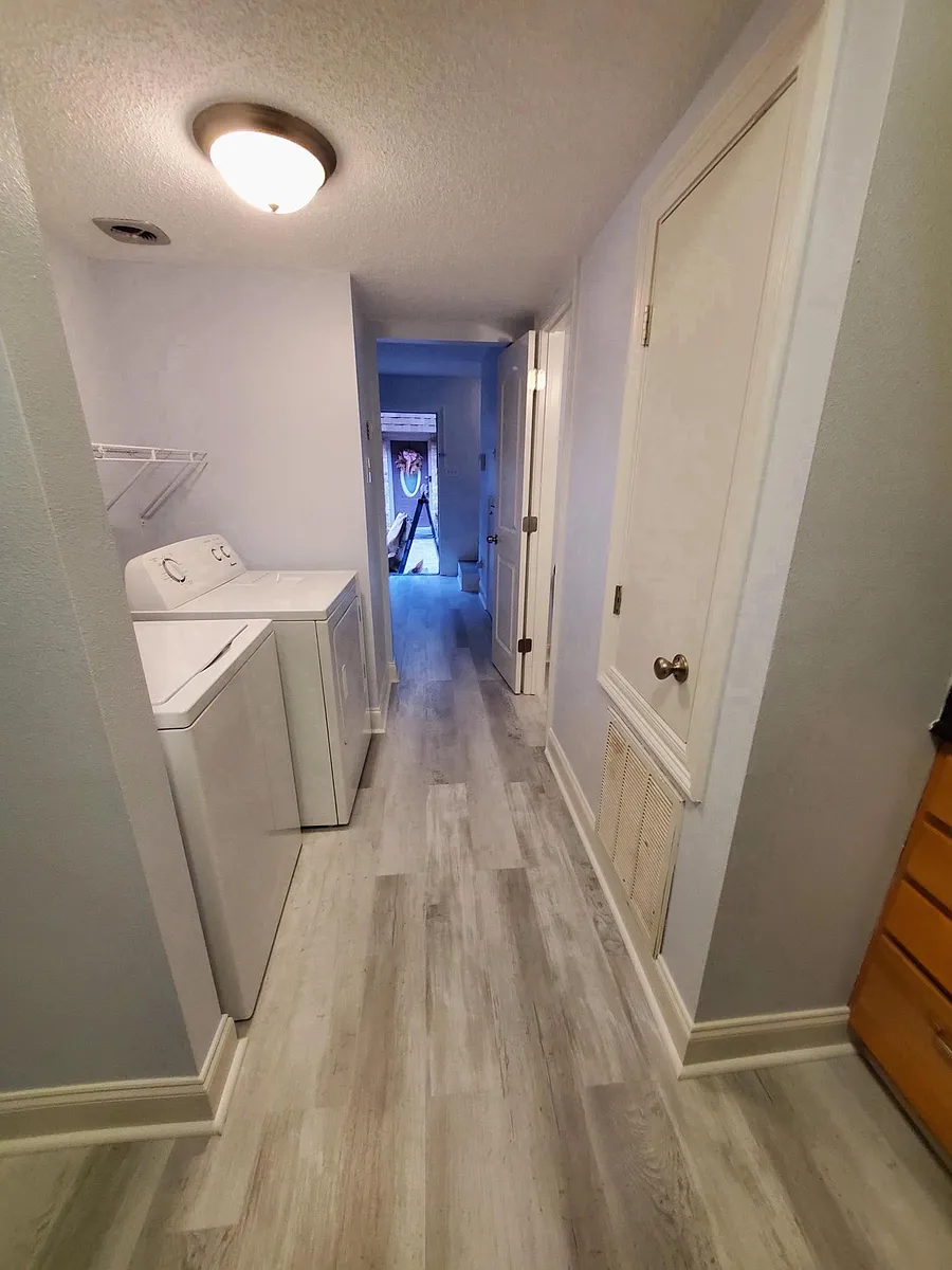VIEW FROM KITCHEN TO FRONT DOOR
NEW FLOORING AND PAINT - 3126 Independence St #B