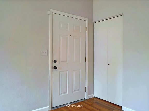 As you enter the home your first stop is the living room with hardwood floors throughout. 