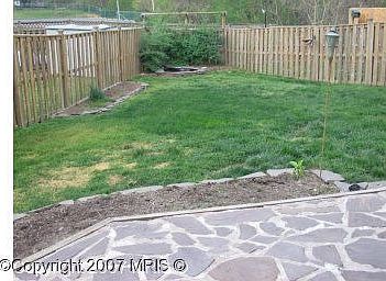 Looking from patio to the back of the backyard