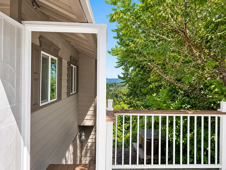 Stairs to middle floor entry from driveway
