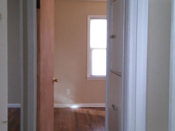 Hallway with storage cabinets