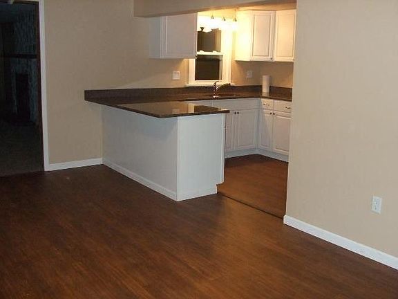 Oversized quartz counter for additional seating.