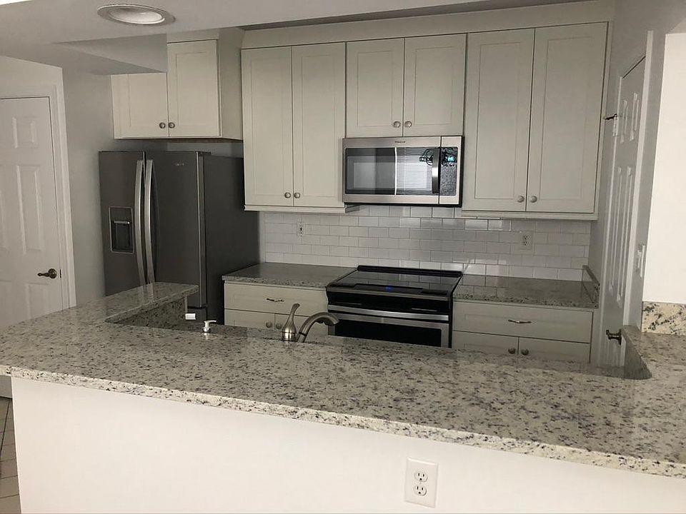 New kitchen with all stainless appliances.