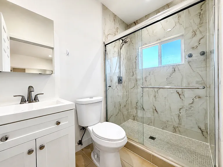 10723 Rhodesia Ave — Photo 10