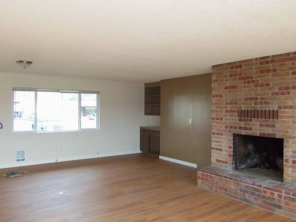 living room with fireplac