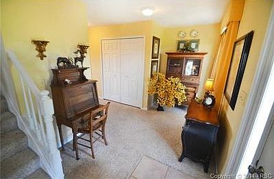 Entry foyer with coat closet.