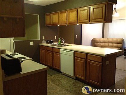 Kitchen with dining area in background