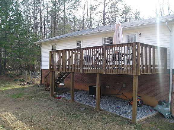 Back of home with remodeled deck.