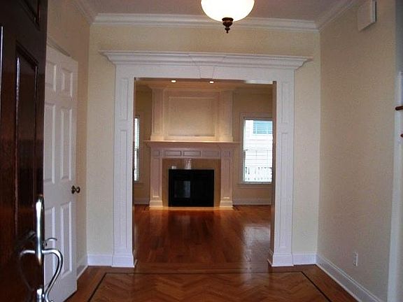 Foyer Views to Living Room w/Fireplace; Elegant Details