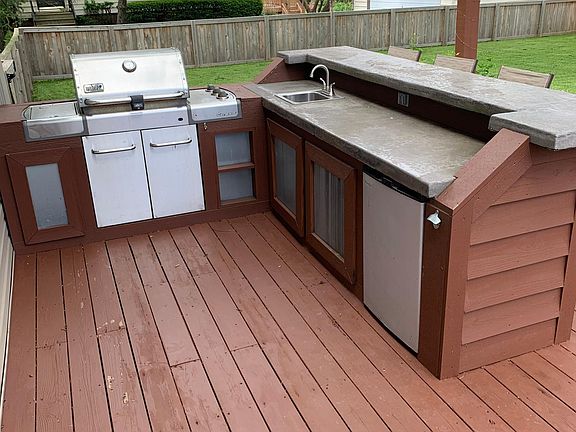 Wet bar, refrigerator, sink, Weber grill