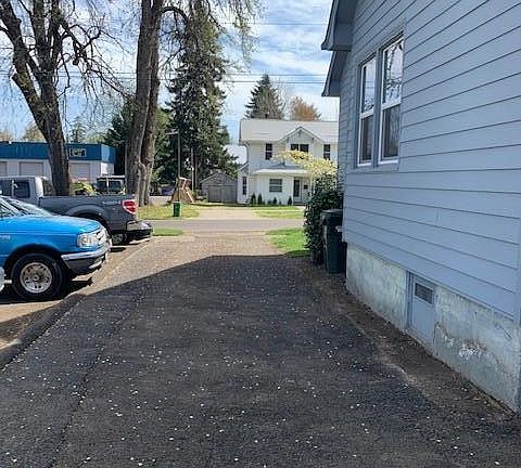 looking down the driveway from the garge