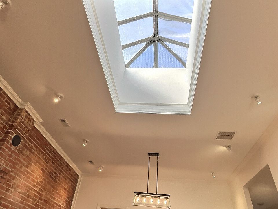 Antique sky light above great room fills the room with natural light