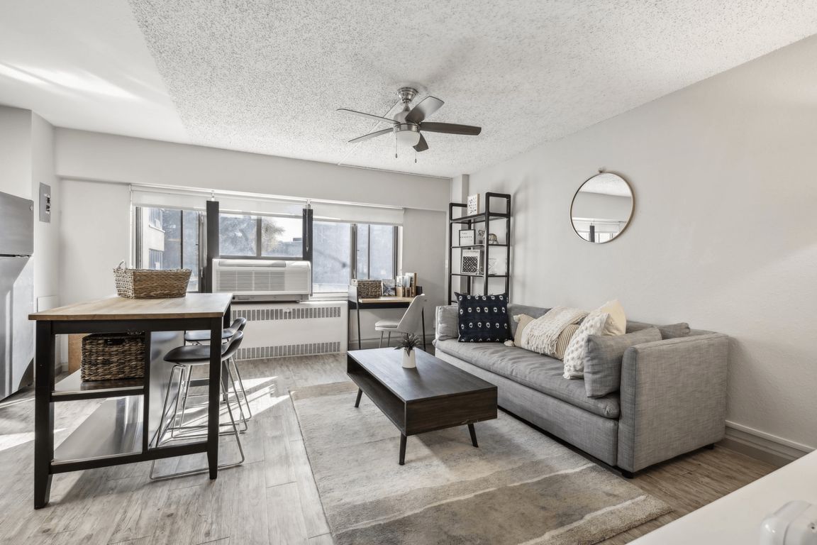 This beautiful living room is spacious enough for almost any customization