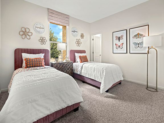 Spacious second bedroom with walk-in closet.