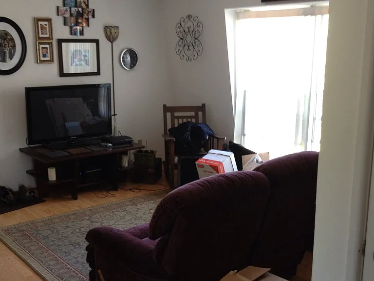 Living room with floor to ceiling windows