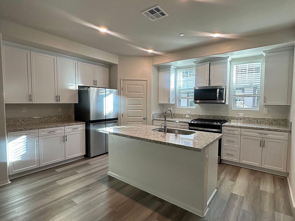 Luxury Vinyl Plank flooring in Kitchen & Living area