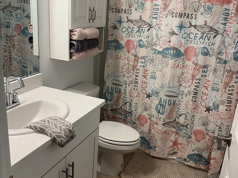 2nd bedroom bath with shower and tub