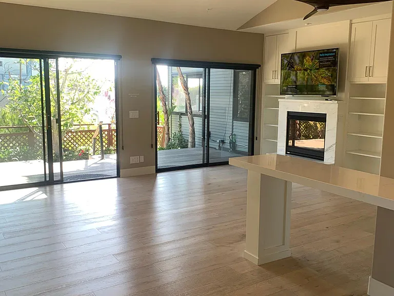 Open space concept 750 square foot Casita with soaring beamed ceilings.