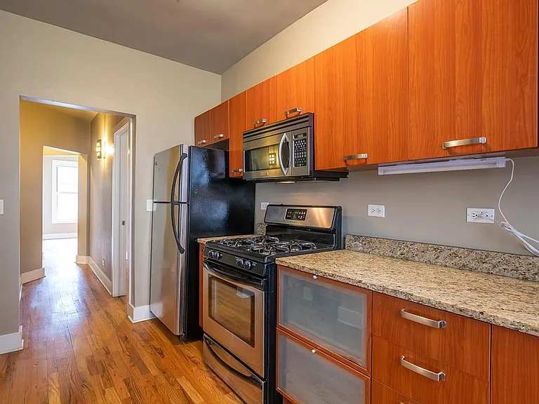 New cabinetry, beautiful granite countertops, stainless steel appliances, dishwasher, and microwave. Plenty of countertop and outlets to help you create your favorite meals.