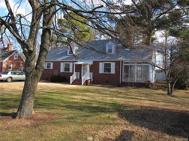 Adorable 4 bedroom cape cod with sun room on 1/2 acre+ lot!!