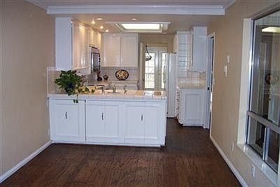 sitting are looking toward kitchen