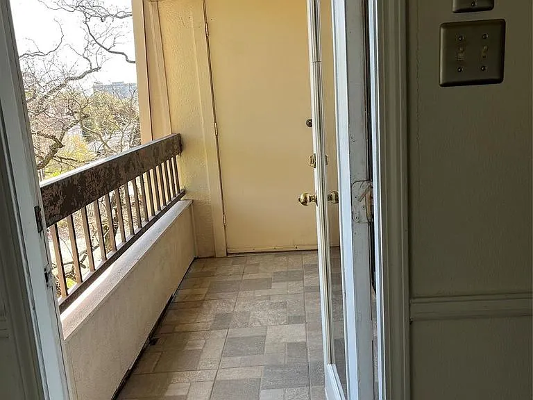 porch. unit on 3rd floor. peaceful view.