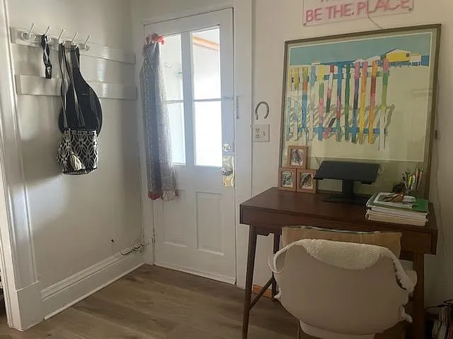 This is the back-side of the entry door from the enclosed patio. Bathroom to the right, living room to the left.