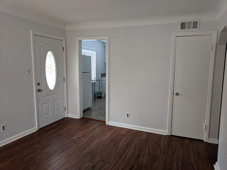 Living room looking into kitchen