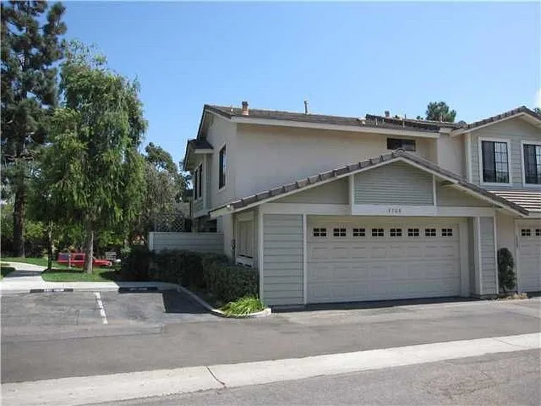 Corner unit with adjacent guest parking