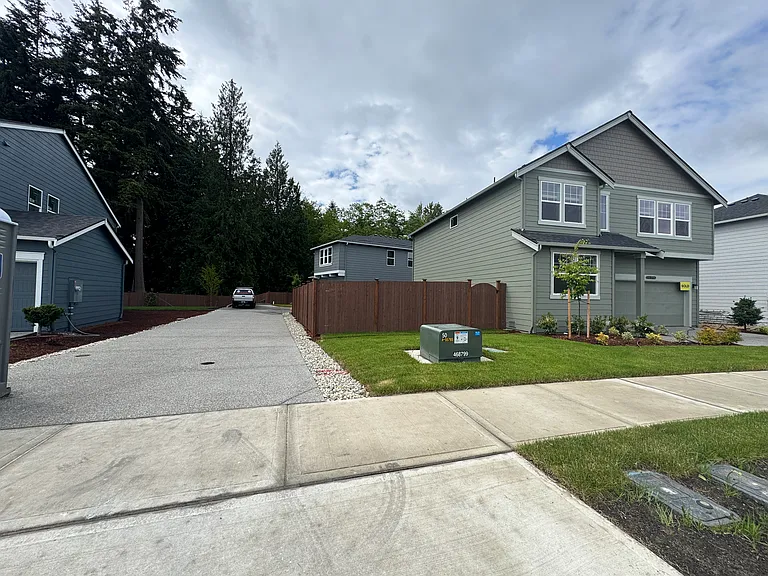 View from street at start of 70 foot private driveway.