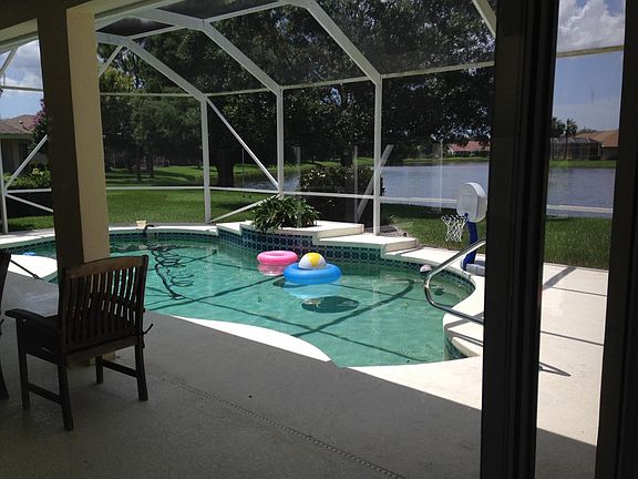 Pool and deck overlooking water